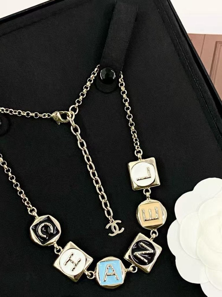 Authentic Chanel Limited Edition Multi-Color Letter Chane Pearl Necklace